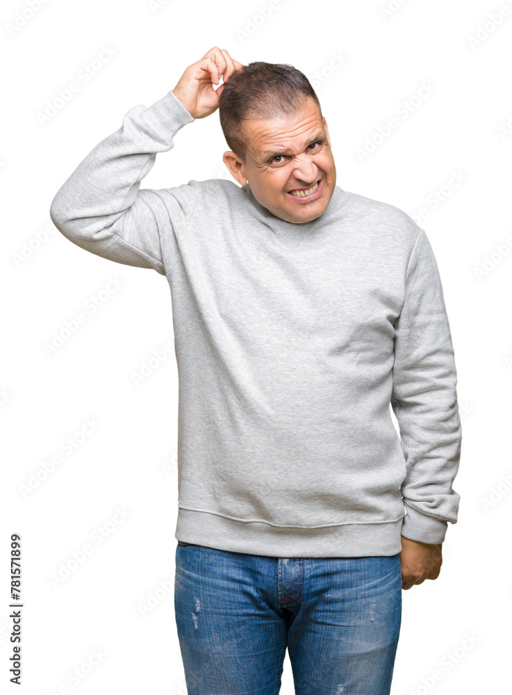 Middle age arab man wearing sport sweatshirt over isolated background confuse and wonder about question. Uncertain with doubt, thinking with hand on head. Pensive concept. Middle age arab man wearing sport sweatshirt over isolated background confuse and wonder about question. Uncertain with doubt, thinking with hand on head. Pensive concept.