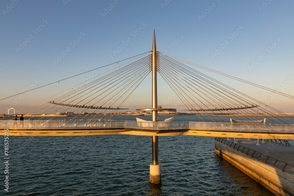 Naklejka premium Qetaifan Island Suspension Park, which allows visitors to see the sea water from below and see the Boulevard Towers from there, Qatar, Lusail