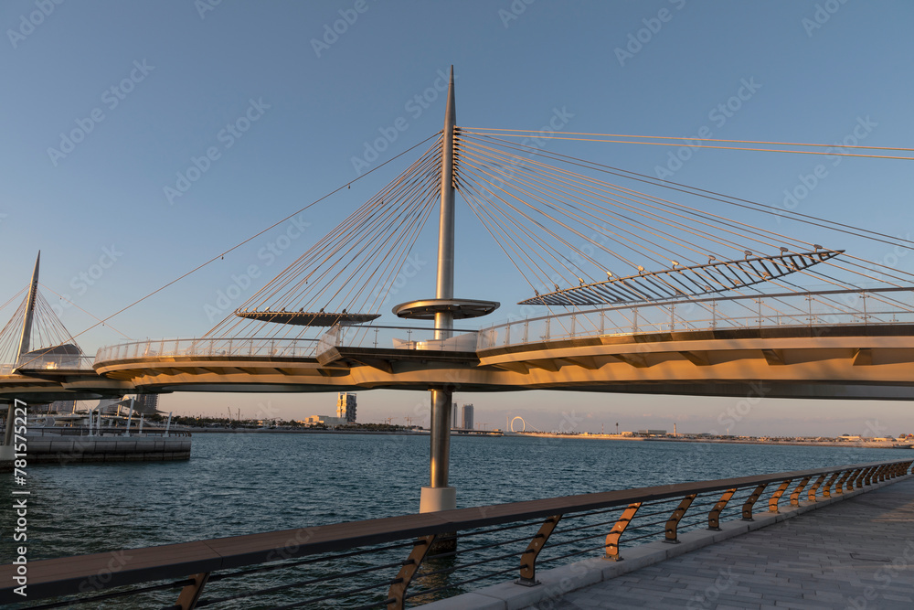 Obraz premium Qetaifan Island Suspension Park, which allows visitors to see the sea water from below and see the Boulevard Towers from there, Qatar, Lusail