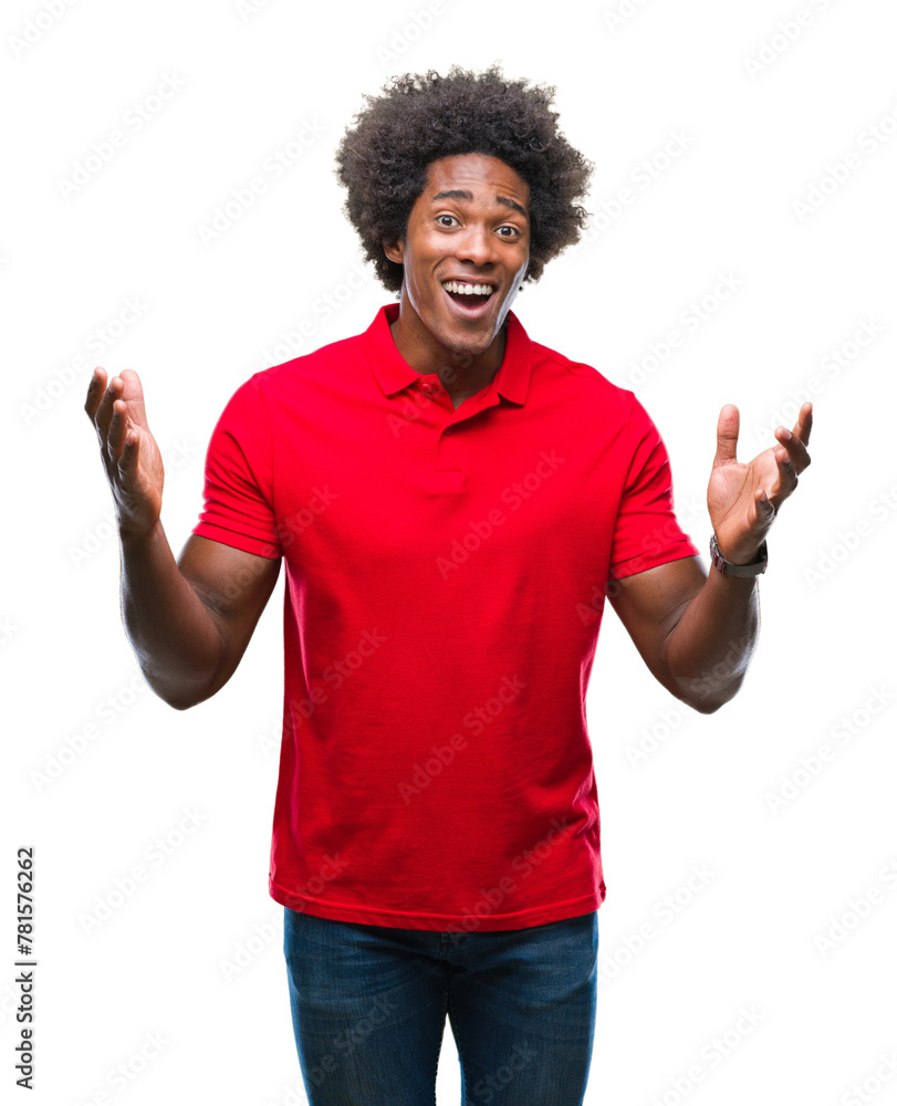 Afro american man over isolated background celebrating crazy and amazed for success with arms raised and open eyes screaming excited. Winner concept Afro american man over isolated background celebrating crazy and amazed for success with arms raised and open eyes screaming excited. Winner concept
