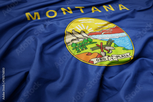 big waving national flag of montana state. macro shot