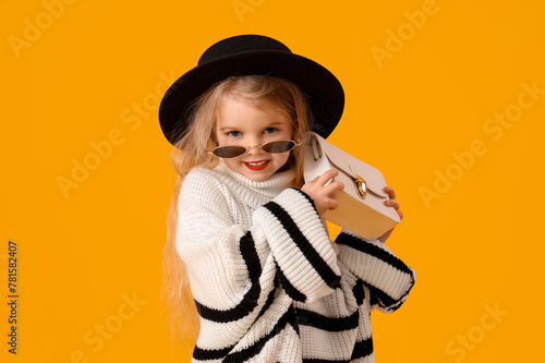 Stylish little girl with bl...