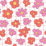 Retro 60s groovy psychedelic seamless pattern background. Cartoon hippie style pink flowers, hand drawn daisies on checkered background