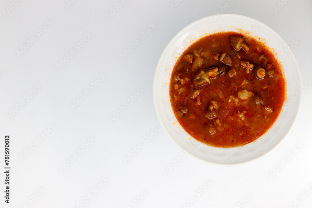 Okra soup with meat, white isolated background. Okra soup with meat, white isolated background.