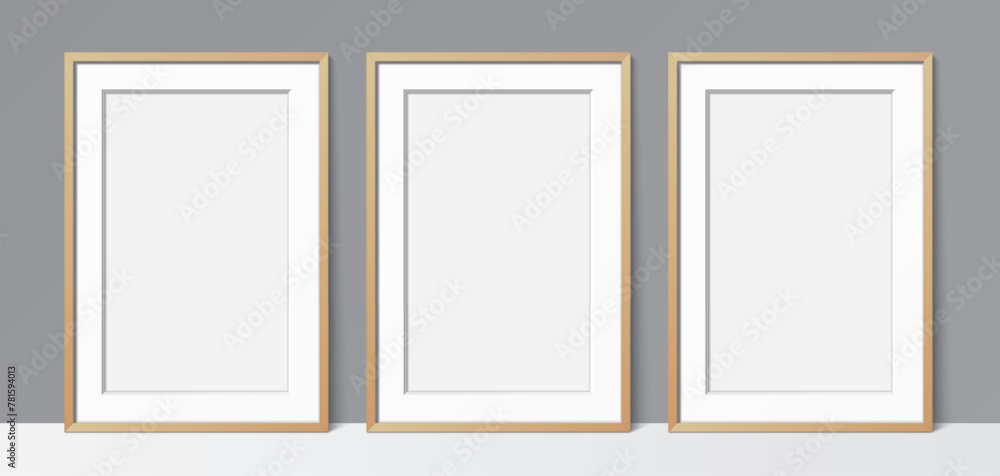 3 Blanck poster wooden frames leaning against a grey wall background. Poster gallery vector mockup for art, image, or text placement. 3 Blanck poster wooden frames leaning against a grey wall background. Poster gallery vector mockup for art, image, or text placement.