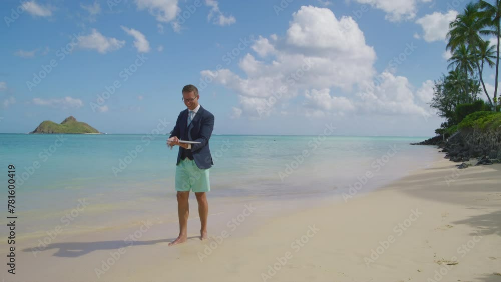 Caucasian businessman in suit and beach shorts celebrating victory after conducting web conference on laptop surrounded by stunning beauty of tropical beach. High quality 4k footag Caucasian businessman in suit and beach shorts celebrating victory after conducting web conference on laptop surrounded by stunning beauty of tropical beach. High quality 4k footag