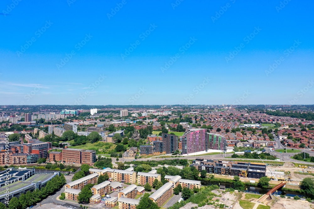 Aerial photo of the Leeds city centre showing the city centre from above on a bright sunny summers day.