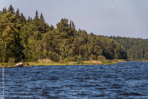 view from a motor boat of the water of Lake Ladoga and rocky islands. Ladoga skerries. Beautiful landscape photo