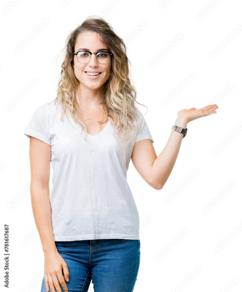 Beautiful young blonde woman wearing glasses over isolated background smiling cheerful presenting and pointing with palm of hand looking at the camera. Beautiful young blonde woman wearing glasses over isolated background smiling cheerful presenting and pointing with palm of hand looking at the camera.