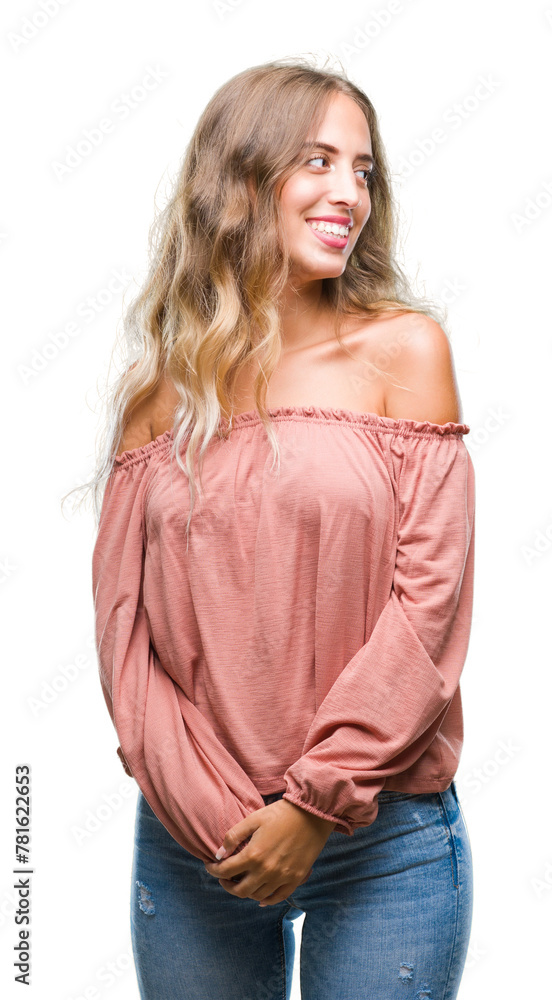 Beautiful young blonde woman over isolated background looking away to side with smile on face, natural expression. Laughing confident. Beautiful young blonde woman over isolated background looking away to side with smile on face, natural expression. Laughing confident.