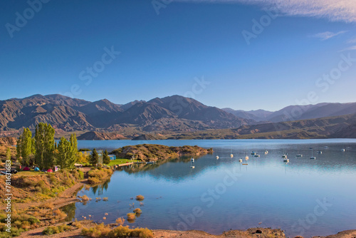 Lake Potrerillos on a sunny day, in Mendoza, Argentina. Elevated view. photo