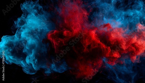 dense multicolored smoke of red and blue colors on a black isolated background © Raegan