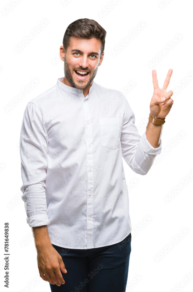 Young handsome man over isolated background smiling with happy face winking at the camera doing victory sign. Number two. Young handsome man over isolated background smiling with happy face winking at the camera doing victory sign. Number two.