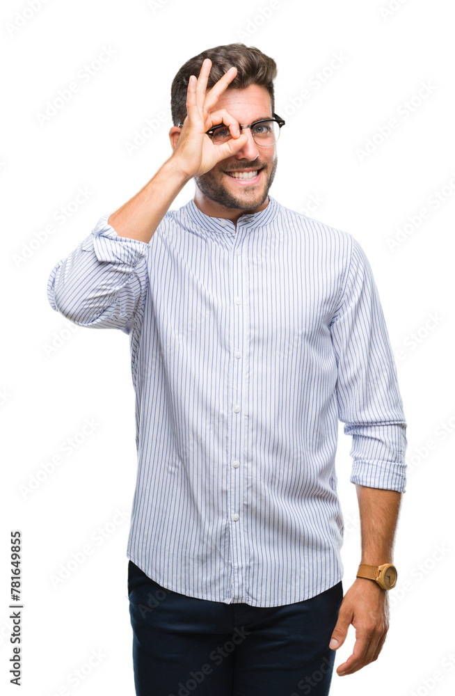 Young handsome man over isolated background doing ok gesture with hand smiling, eye looking through fingers with happy face. Young handsome man over isolated background doing ok gesture with hand smiling, eye looking through fingers with happy face.
