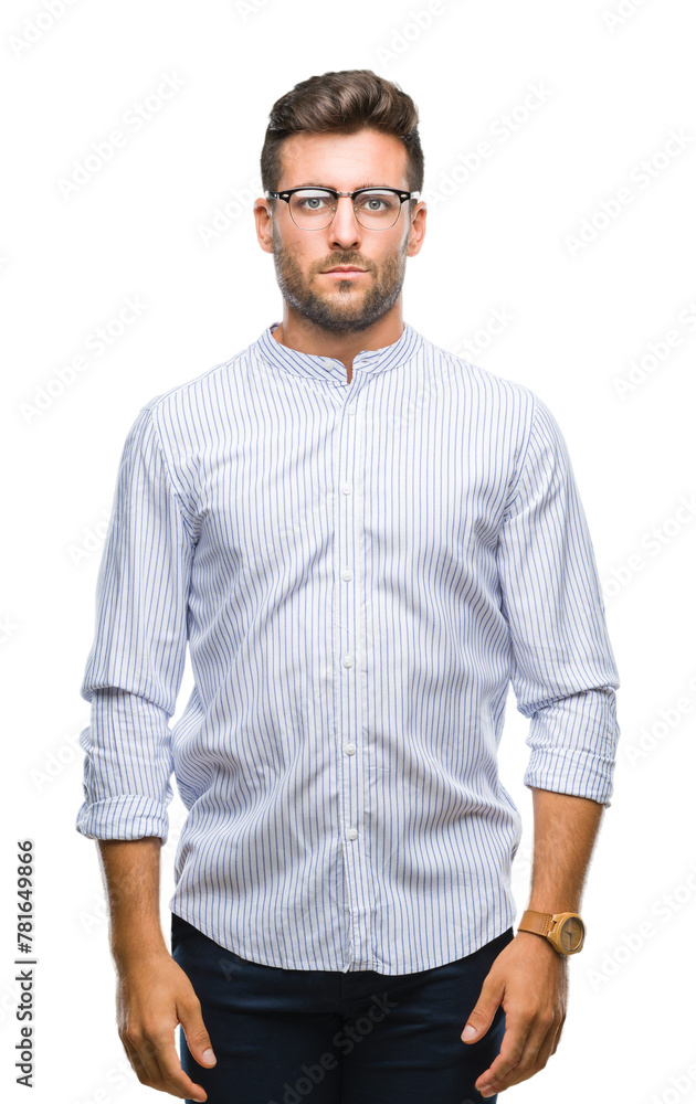 Young handsome man over isolated background with serious expression on face. Simple and natural looking at the camera. Young handsome man over isolated background with serious expression on face. Simple and natural looking at the camera.