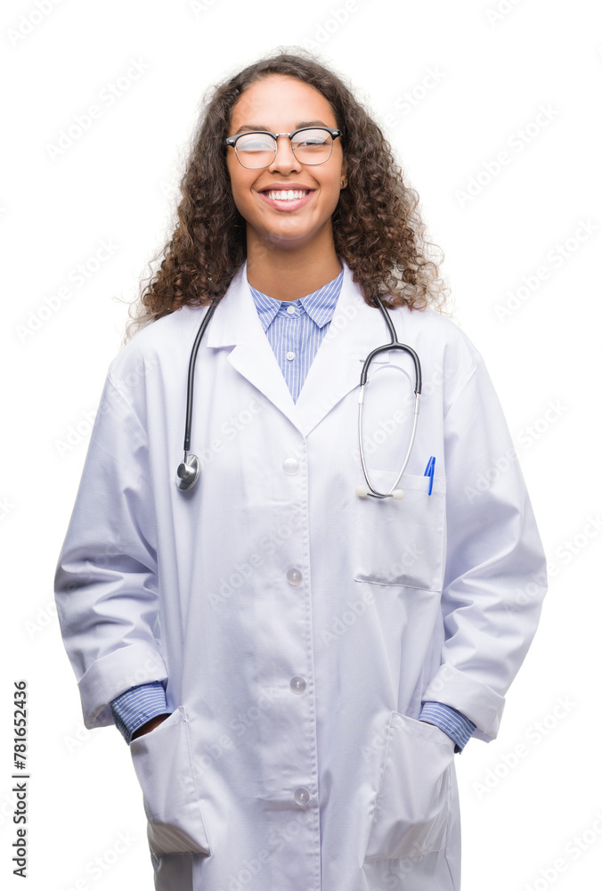 Young hispanic doctor woman with a happy face standing and smiling with a confident smile showing teeth Young hispanic doctor woman with a happy face standing and smiling with a confident smile showing teeth