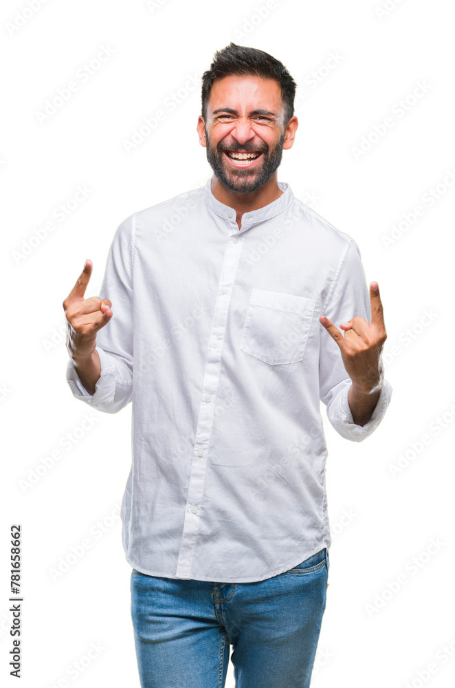 Adult hispanic man over isolated background shouting with crazy expression doing rock symbol with hands up. Music star. Heavy concept. Adult hispanic man over isolated background shouting with crazy expression doing rock symbol with hands up. Music star. Heavy concept.