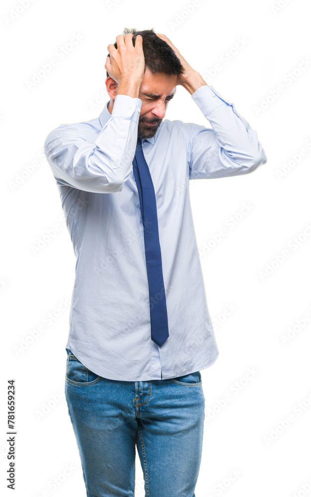 Adult hispanic business man over isolated background suffering from headache desperate and stressed because pain and migraine. Hands on head. Adult hispanic business man over isolated background suffering from headache desperate and stressed because pain and migraine. Hands on head.
