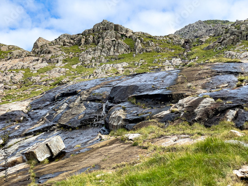 Walking up Pyg Track, Yr Wyddfa (Snowdon) highest mountain in Wales, Gwynedd, Wales photo