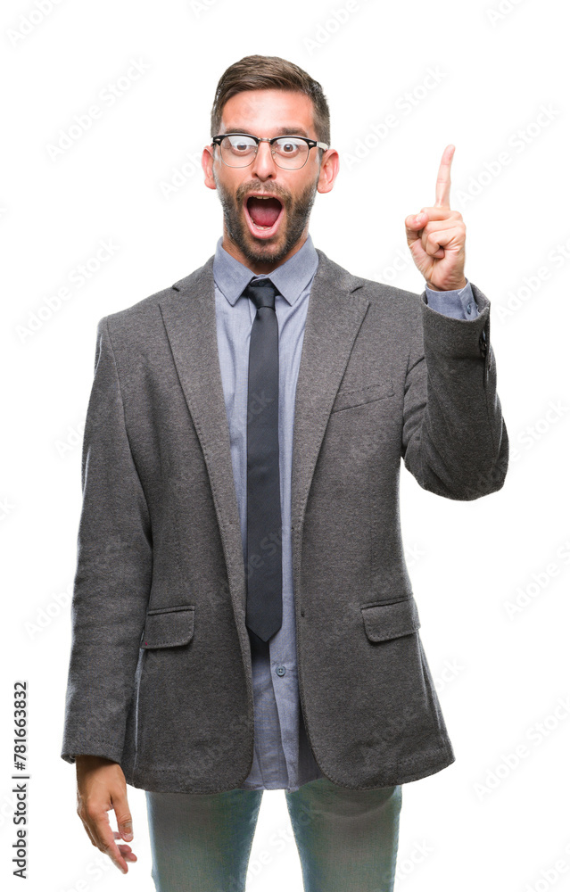 Young handsome business man over isolated background pointing finger up with successful idea. Exited and happy. Number one. Young handsome business man over isolated background pointing finger up with successful idea. Exited and happy. Number one.