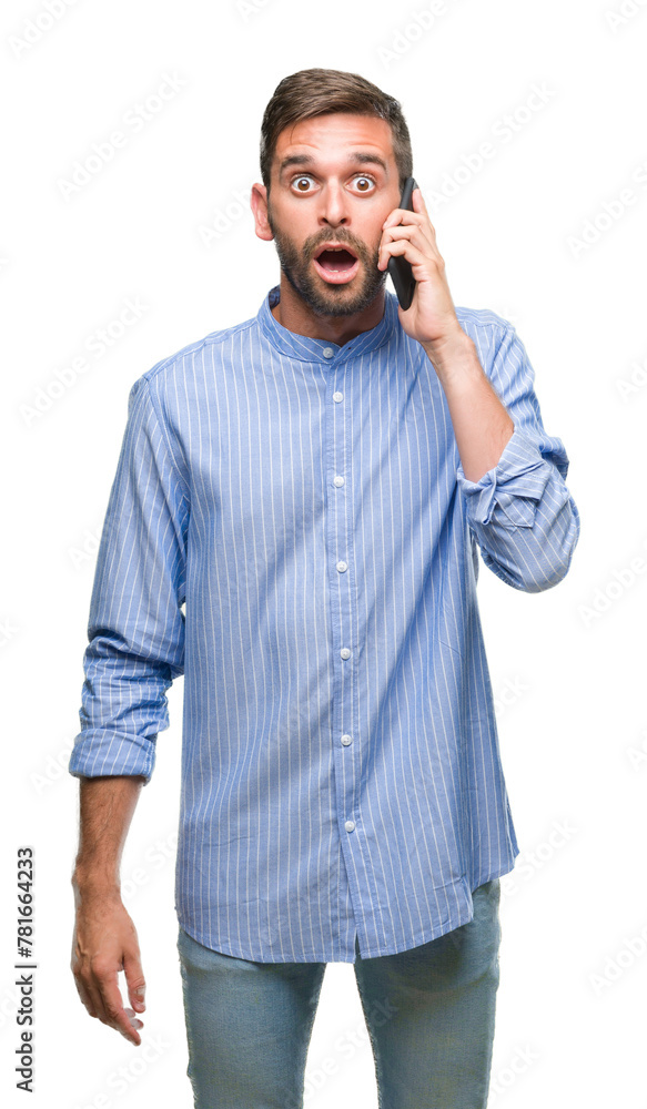 © Krakenimages.com - Young handsome man speaking on the phone over isolated background scared in shock with a surprise face, afraid and excited with fear expression © Krakenimages.com - Young handsome man speaking on the phone over isolated background scared in shock with a surprise face, afraid and excited with fear expression