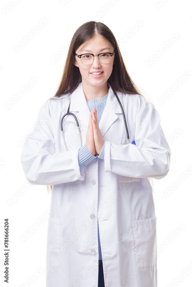 Young Chinese doctor woman over isolated background praying with hands together asking for forgiveness smiling confident. Young Chinese doctor woman over isolated background praying with hands together asking for forgiveness smiling confident.