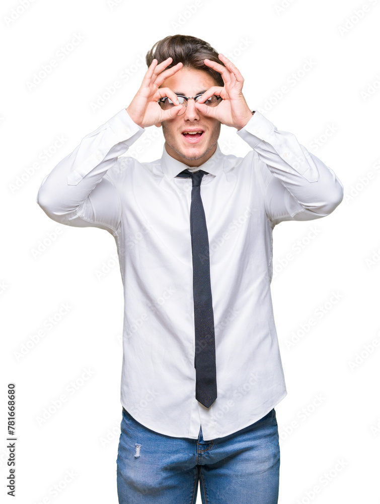 Young business man wearing glasses over isolated background doing ok gesture like binoculars sticking tongue out, eyes looking through fingers. Crazy expression. Young business man wearing glasses over isolated background doing ok gesture like binoculars sticking tongue out, eyes looking through fingers. Crazy expression.
