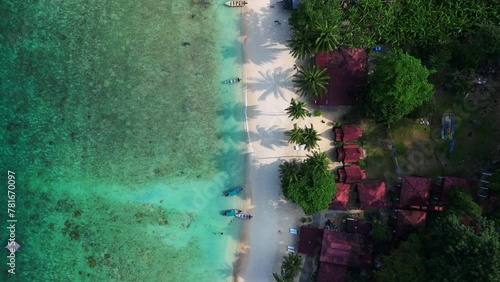 Wallpaper Mural Huts boats on Tropical beach lush greenery. Amazing aerial top view flight drone Torontodigital.ca