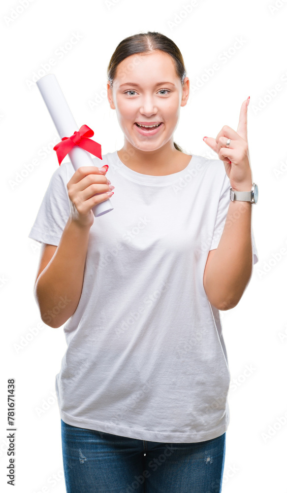 Young caucasian woman holding degree over isolated background surprised with an idea or question pointing finger with happy face, number one Young caucasian woman holding degree over isolated background surprised with an idea or question pointing finger with happy face, number one