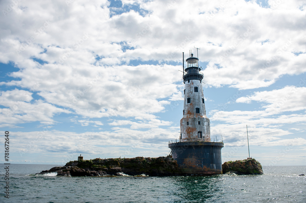 Abandoned lighthouse on small rocky island in Lake Superior Abandoned lighthouse on small rocky island in Lake Superior