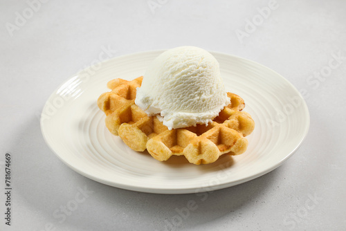 plate of belgian waffle with vanilla ice cream