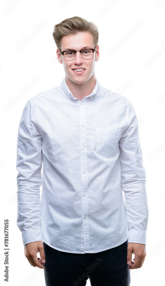 Young handsome blond man with a happy and cool smile on face. Lucky person. Young handsome blond man with a happy and cool smile on face. Lucky person.