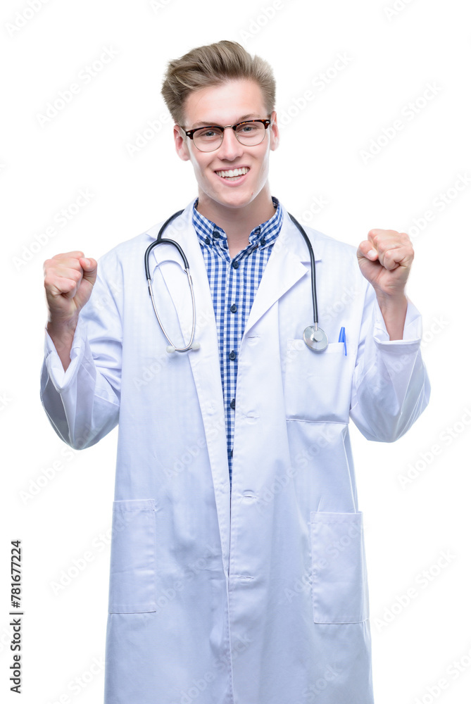 Young handsome blond doctor screaming proud and celebrating victory and success very excited, cheering emotion