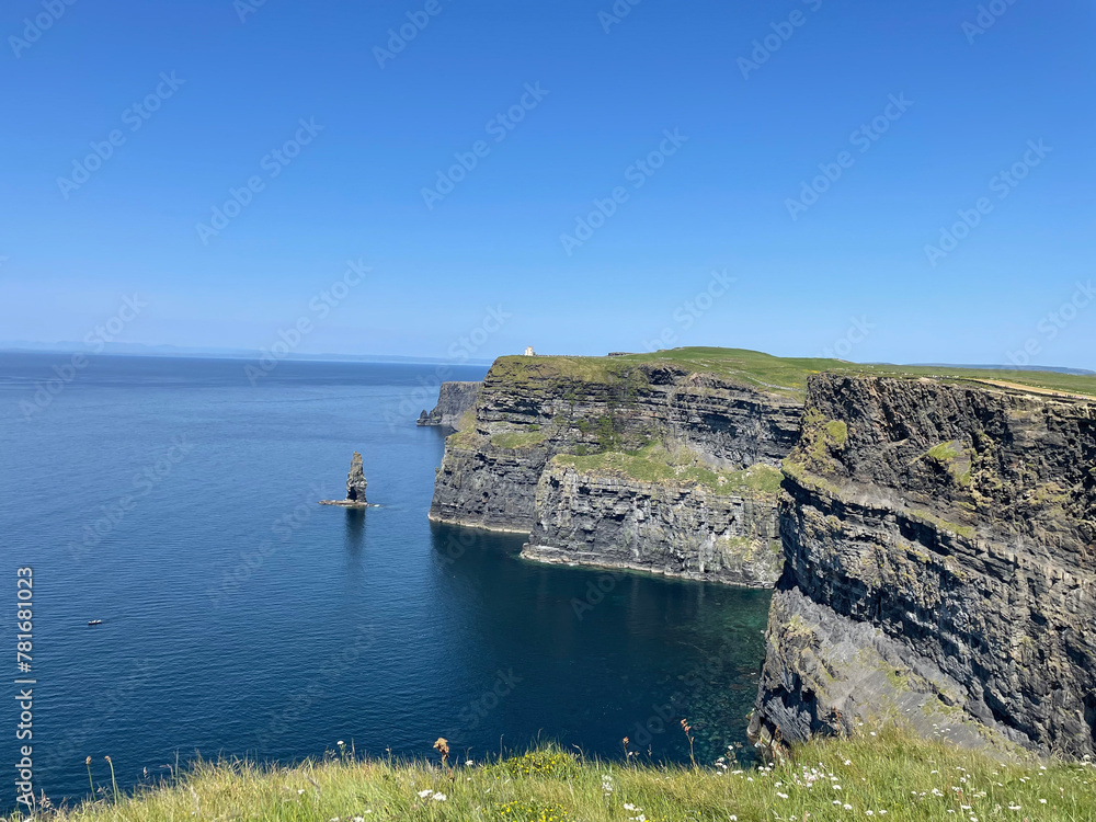 View from the cliffs of Moher, rocks, green pastures, Irish sea, landscape photography, travel