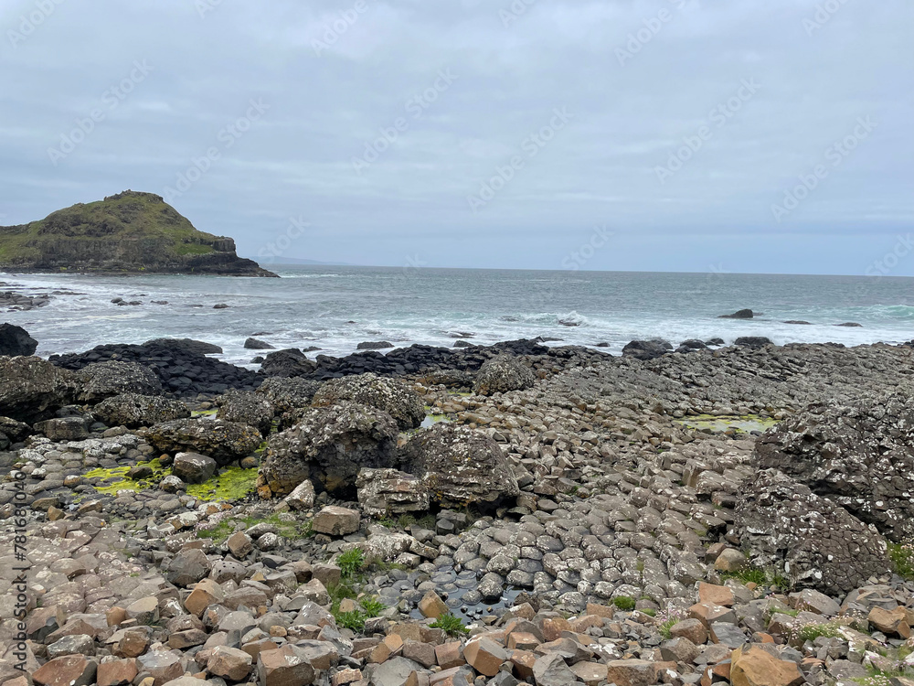Giant's Causeway, Northern Ireland, colorful stones, calm sea, landscape photography