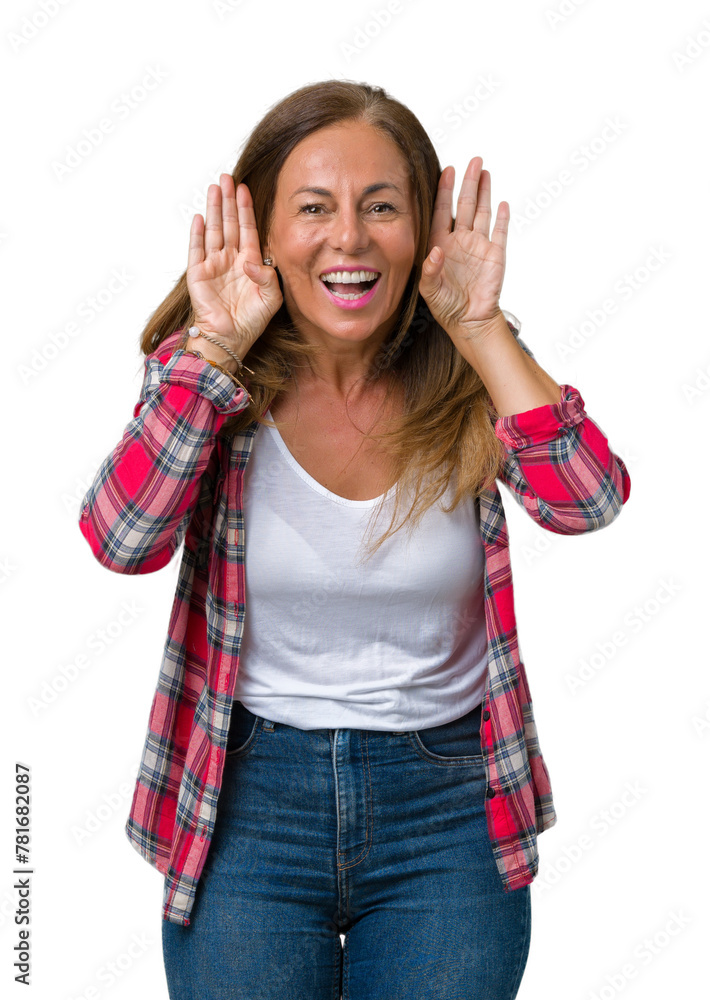 Beautiful middle age woman wearing over isolated background Trying to hear both hands on ear gesture, curious for gossip. Hearing problem, deaf Beautiful middle age woman wearing over isolated background Trying to hear both hands on ear gesture, curious for gossip. Hearing problem, deaf