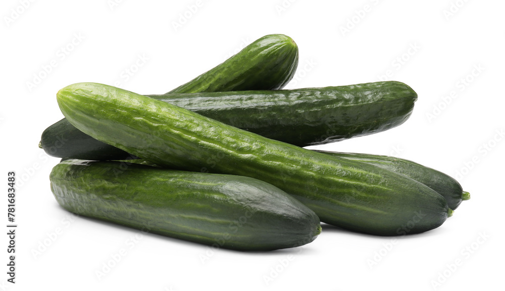 Many long fresh cucumbers isolated on white Many long fresh cucumbers isolated on white