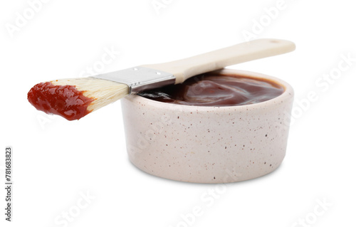 Photos Marinade in bowl and basting brush isolated on white