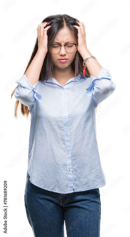 Young asian business woman wearing glasses over isolated background suffering from headache desperate and stressed because pain and migraine. Hands on head. Young asian business woman wearing glasses over isolated background suffering from headache desperate and stressed because pain and migraine. Hands on head.