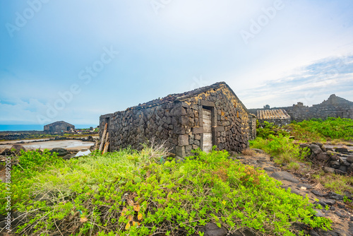 Stone houses and stone piles in the ancient salt fields of Yanding, Danzhou, Hainan, China photo