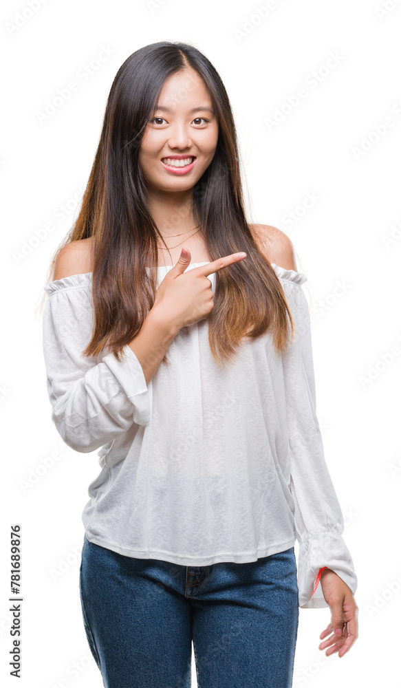 Young asian woman over isolated background cheerful with a smile of face pointing with hand and finger up to the side with happy and natural expression on face looking at the camera. Young asian woman over isolated background cheerful with a smile of face pointing with hand and finger up to the side with happy and natural expression on face looking at the camera.