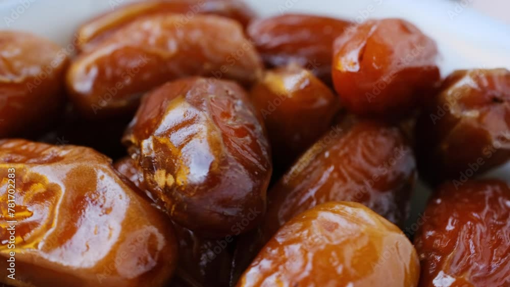 Ramadan fruit, date, on rotating background Ramadan fruit, date, on rotating background