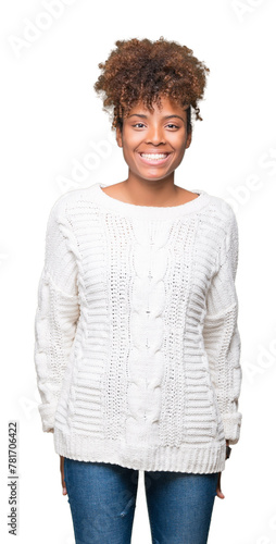 Beautiful young african american woman wearing winter sweater over isolated background with a happy and cool smile on face. Lucky person.