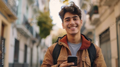 Young man smiling, using a smart phone on the street generative ai © Francheska