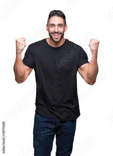 Young handsome man over isolated background celebrating surprised and amazed for success with arms raised and open eyes. Winner concept.