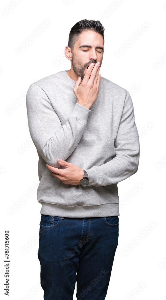Young handsome man wearing sweatshirt over isolated background bored yawning tired covering mouth with hand. Restless and sleepiness. Young handsome man wearing sweatshirt over isolated background bored yawning tired covering mouth with hand. Restless and sleepiness.