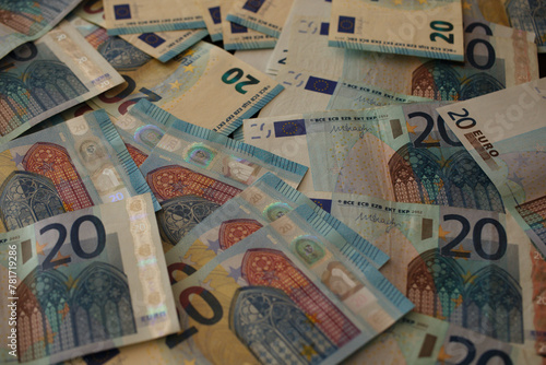Euro currency banknotes on black background. Exchange money symbol of wealth. Eurozone with currency. The euro is the monetary unit and currency of the European Union