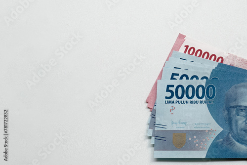 Rupiah notes on a white background