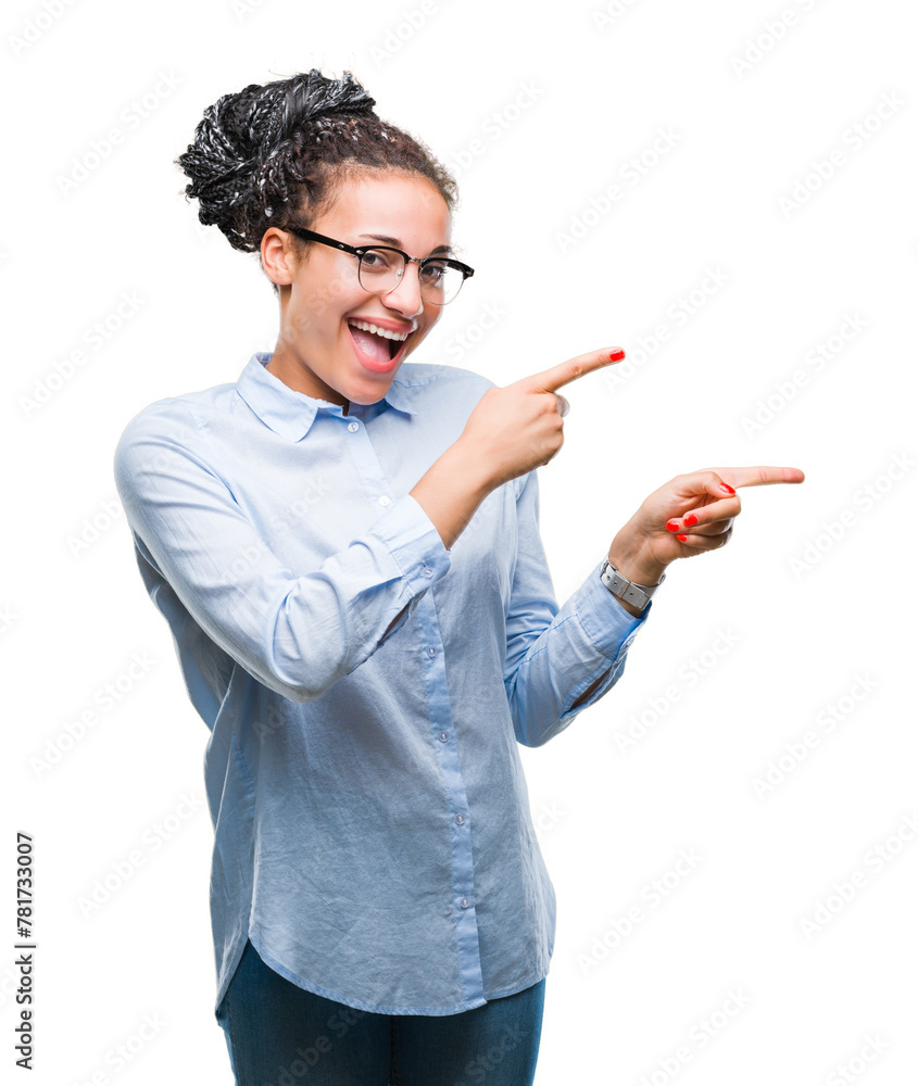 Young braided hair african american business girl wearing glasses over isolated background smiling and looking at the camera pointing with two hands and fingers to the side. Young braided hair african american business girl wearing glasses over isolated background smiling and looking at the camera pointing with two hands and fingers to the side.