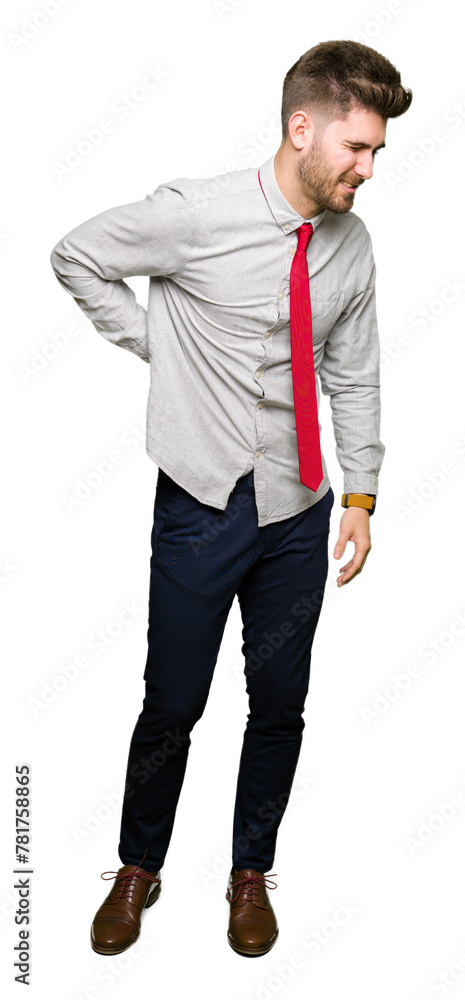 Young handsome business man Suffering of backache, touching back with hand, muscular pain Young handsome business man Suffering of backache, touching back with hand, muscular pain